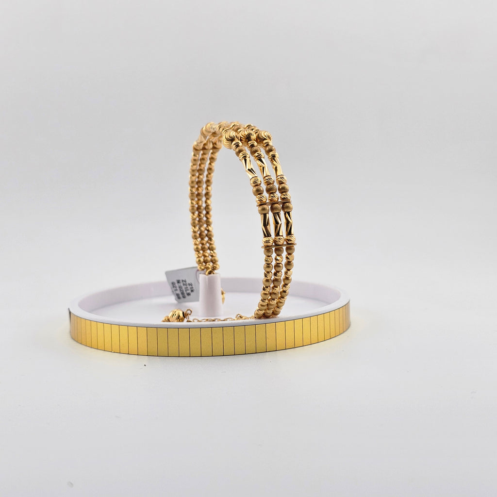 21Karat Gold Triple Strand Braided Bangle – 21.88g