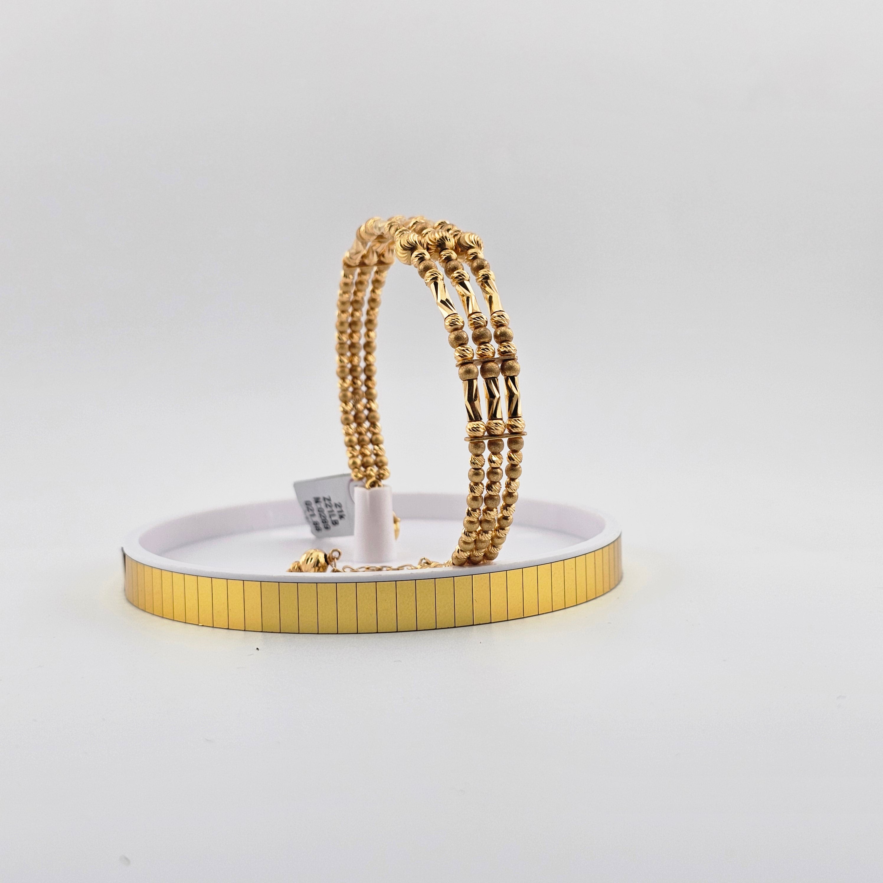 21Karat Gold Triple Strand Braided Bangle – 21.88g
