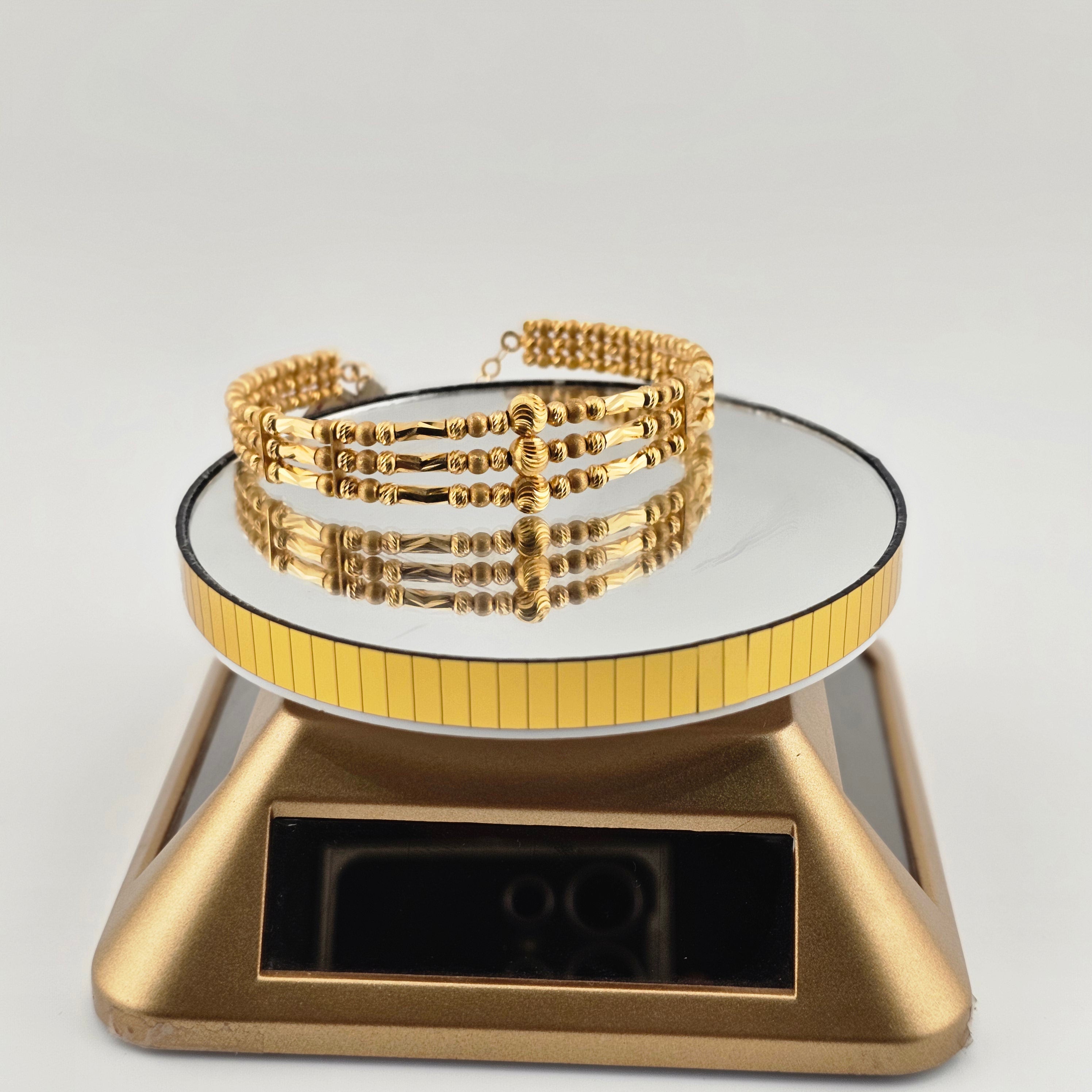 21Karat Gold Triple Strand Braided Bangle – 21.88g