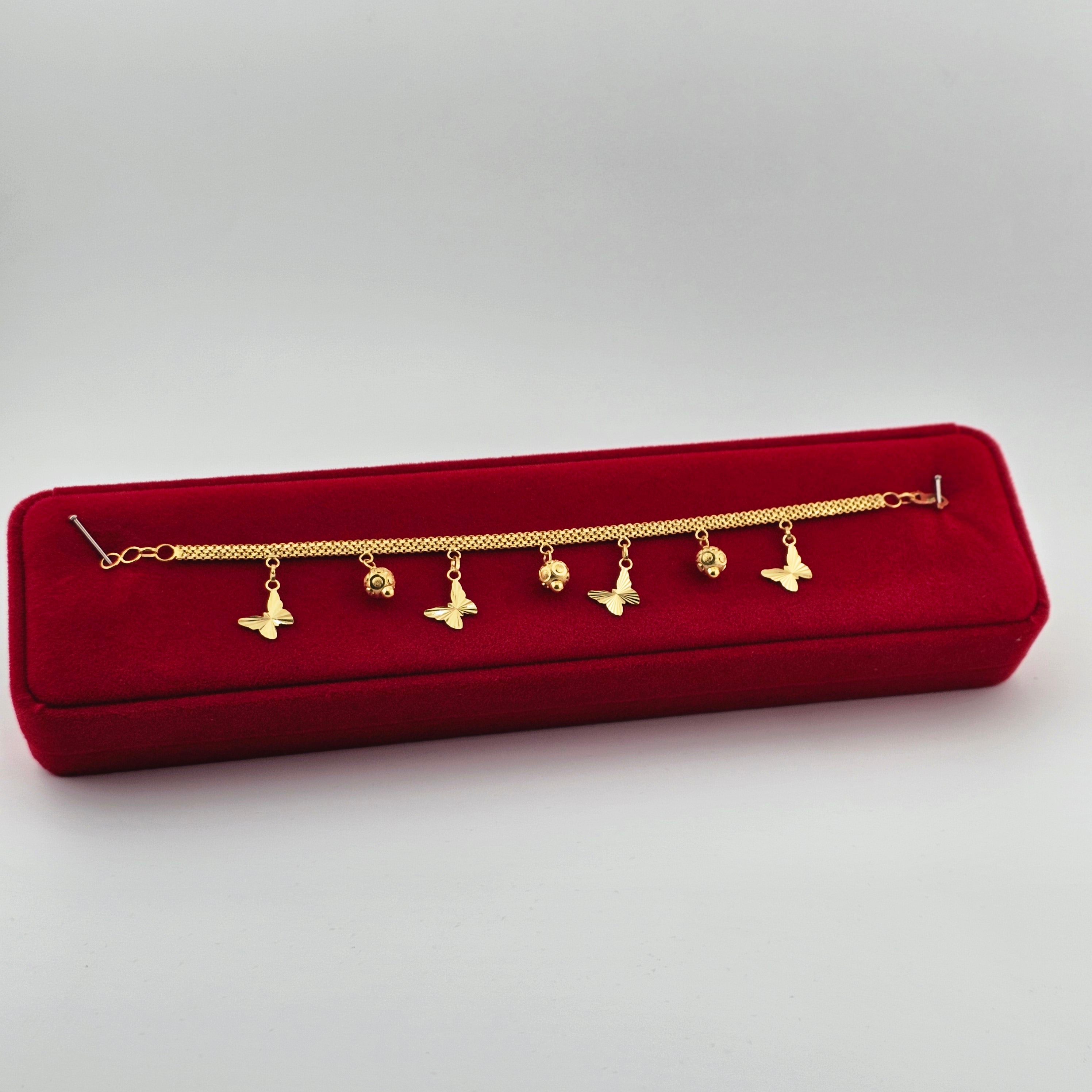 21 Karat Gold Bracelet with Hanging Charms - 6.85g