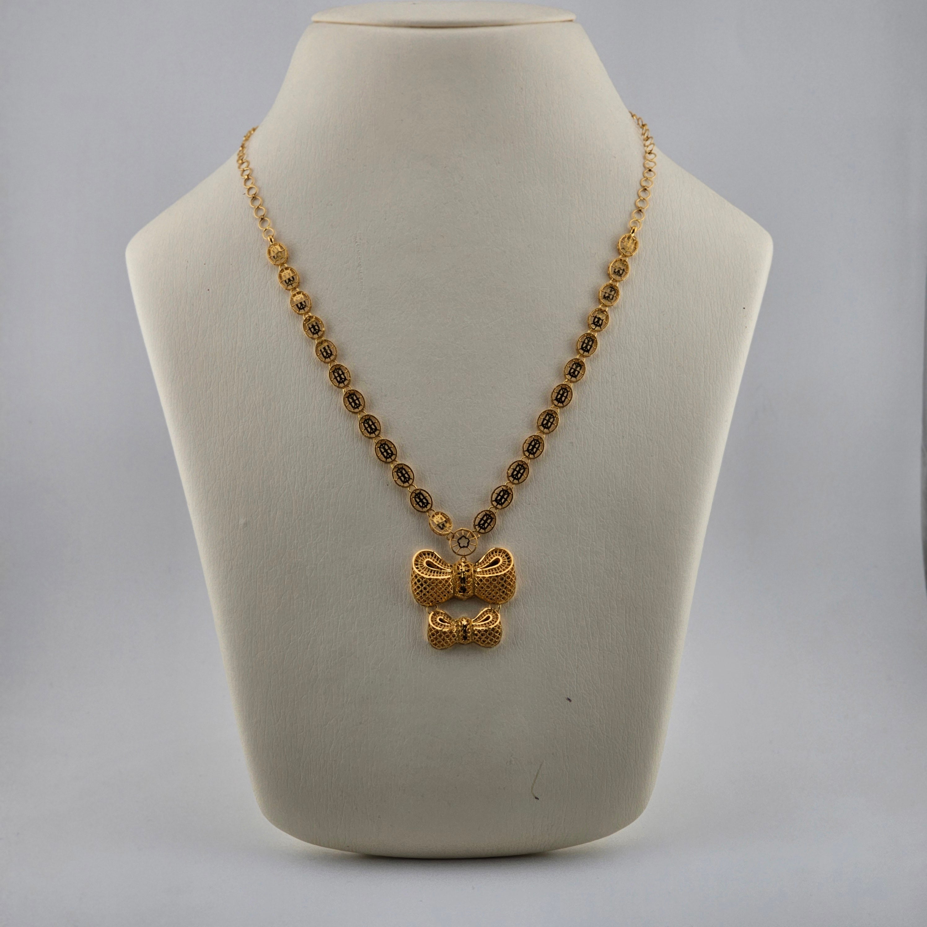 21 Karat Gold Bow Pendant Necklace – 15.64g