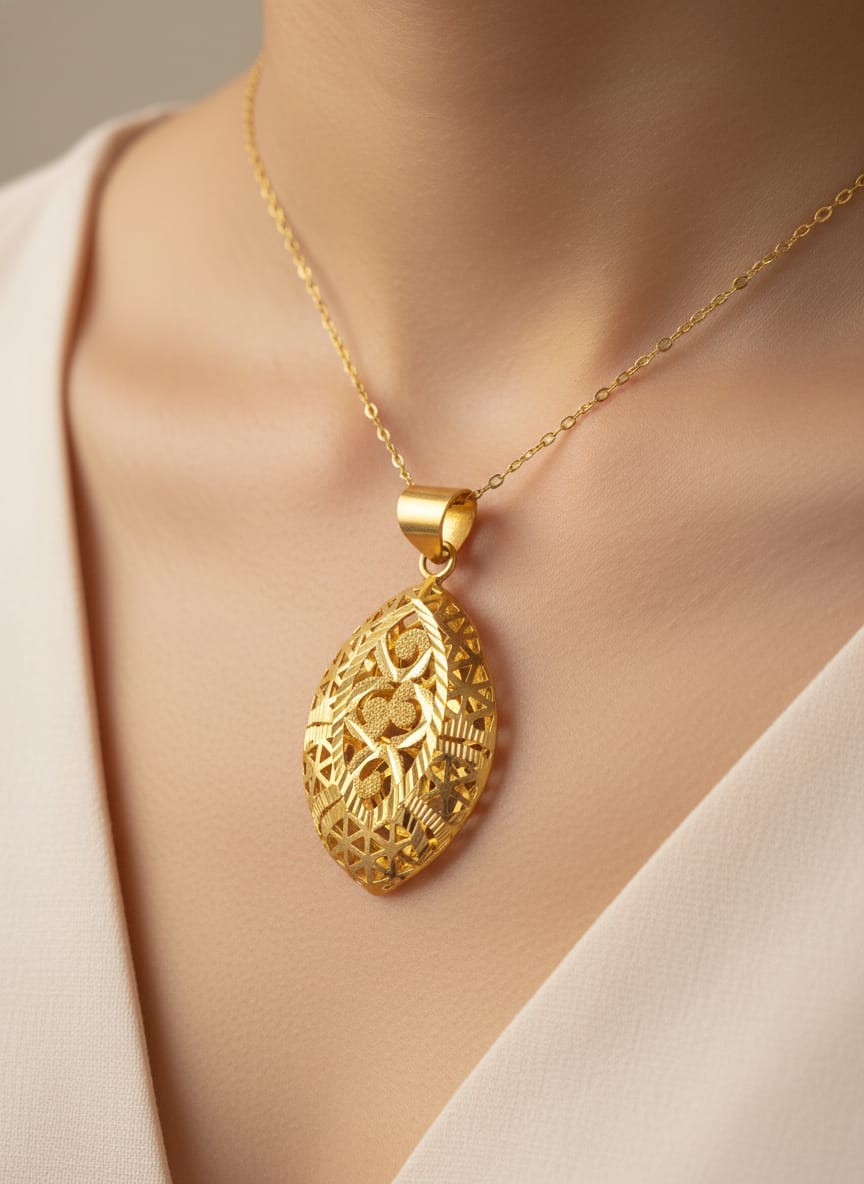 21 Karat Gold Leaf-Inspired Filigree Oval Pendant – 5.08g